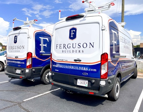 Two flet vans with partial wraps.