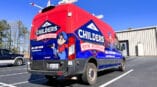 Full red and blue van wrap with logo and contact info for Childers Heating and Air Conditioning
