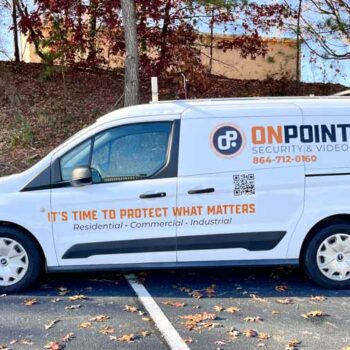Rebranded orange and black logo and text on Transit Connect for On Point in Greenville, SC