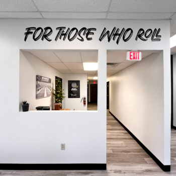 Company slogan in die cut lettering on lobby wall at Newbreed in Greenville, SC