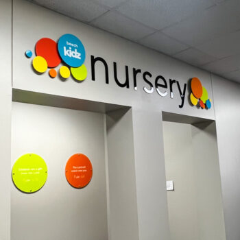 Intricate, dimensional circle display with text for nursery entrance at Beech Springs Baptist Church in Pelzer, SC