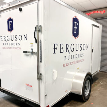 Custom cut logo decals on Ferguson Builders' newest fleet trailer in Greenville, SC