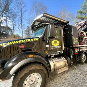 Tree removal truck with custom businsess graphics for D&D Top Notch in Greenville, SC