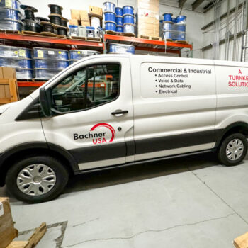Vinyl logo and services decals on fleet van for Bachner in Greenville, SC