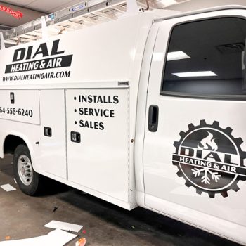 Black matte vinyl fleet graphics for Dial's service truck in Greenville, SC