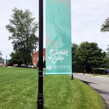 Flag banner displaying Anderson University's summer camp program.