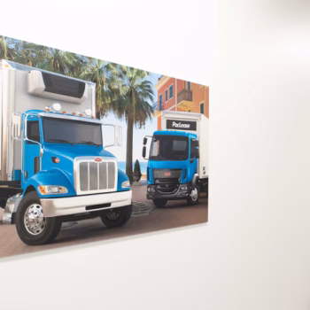 Ultraboard prints of company images depicting Peterbilt trucks at The Pete Store in Columbia, SC