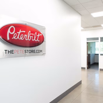 Custom acrylic and acm display showcasing comany logo and website for Peterbilt in Columbia, SC.