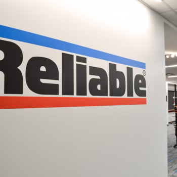 Die-cut logo wall decal in Reliable's training room in Liberty, SC.