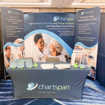 Tradeshow display with multiple fabric displays and a table throw for Chartspan's event team.