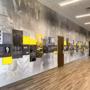 The 1930-1980 section of Blue Ridge Electric Co-Op's timeline display fabricated with wall murals, dimensional numbers, ultraboard prints and pvc prints displayed in Westminister, SC.