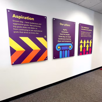 Ultraboard prints mounted with standoffs depicting industry images at Quest Global