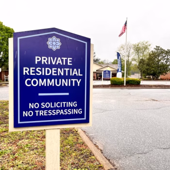 Serenity Apartments private community signage produced with printed ACM applied to an existing sign post