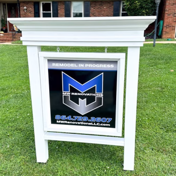 Custom printed yard sign with white frame fabricated by MW Renovations.