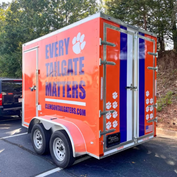 The side view of a helmet themed tailgating trailer wrap for Clemson Tailgaters