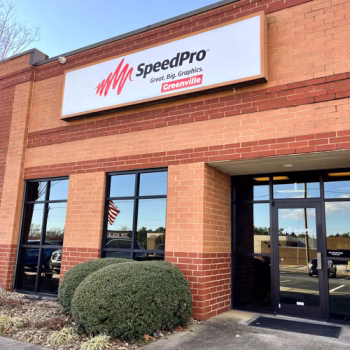 Storefront lighted box sign for SpeedPro Greenville.
