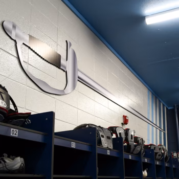 Custom sword printed and cut from pvc and installed on a wall in Dorman High School's team room in Spartanburg, SC.