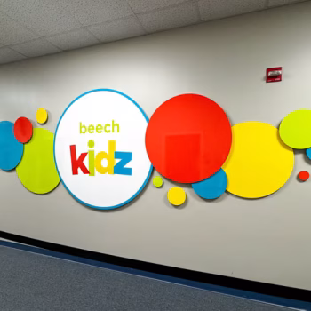Colorful acrylic display with a logo and surrounding bubbles in kids area at Beech Springs Baptist Church in Pelzer, SC.