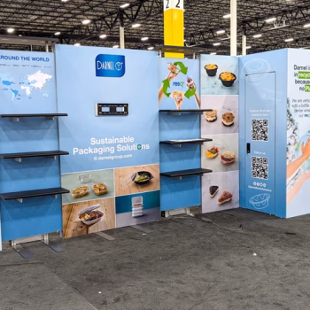 Custom fabricated tradeshow display with a TV mount, shelving and a storage room for Darnel.