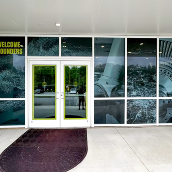 Custom exterior window perf with branded images and graphics at GE Vernova.