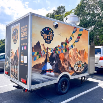 Greenville, SC trailer wrap featuring the creative branding and imagery of the Yak and Yeti food truck.