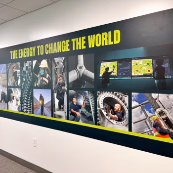 Greenville, SC wall decal showcasing GE Vernova's slogan and images of various employees working in various capacities.