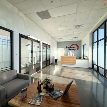 Custom office frosting on front lobby windows at Bachner.