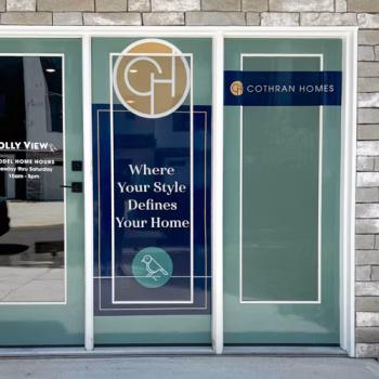 Custom door wrapping for a Cothran Homes' new development office.