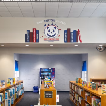 Custom elementary school logo decal inside Wright Elementary School's library.