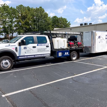Spot graphics on a truck and trailer for Huskamp.