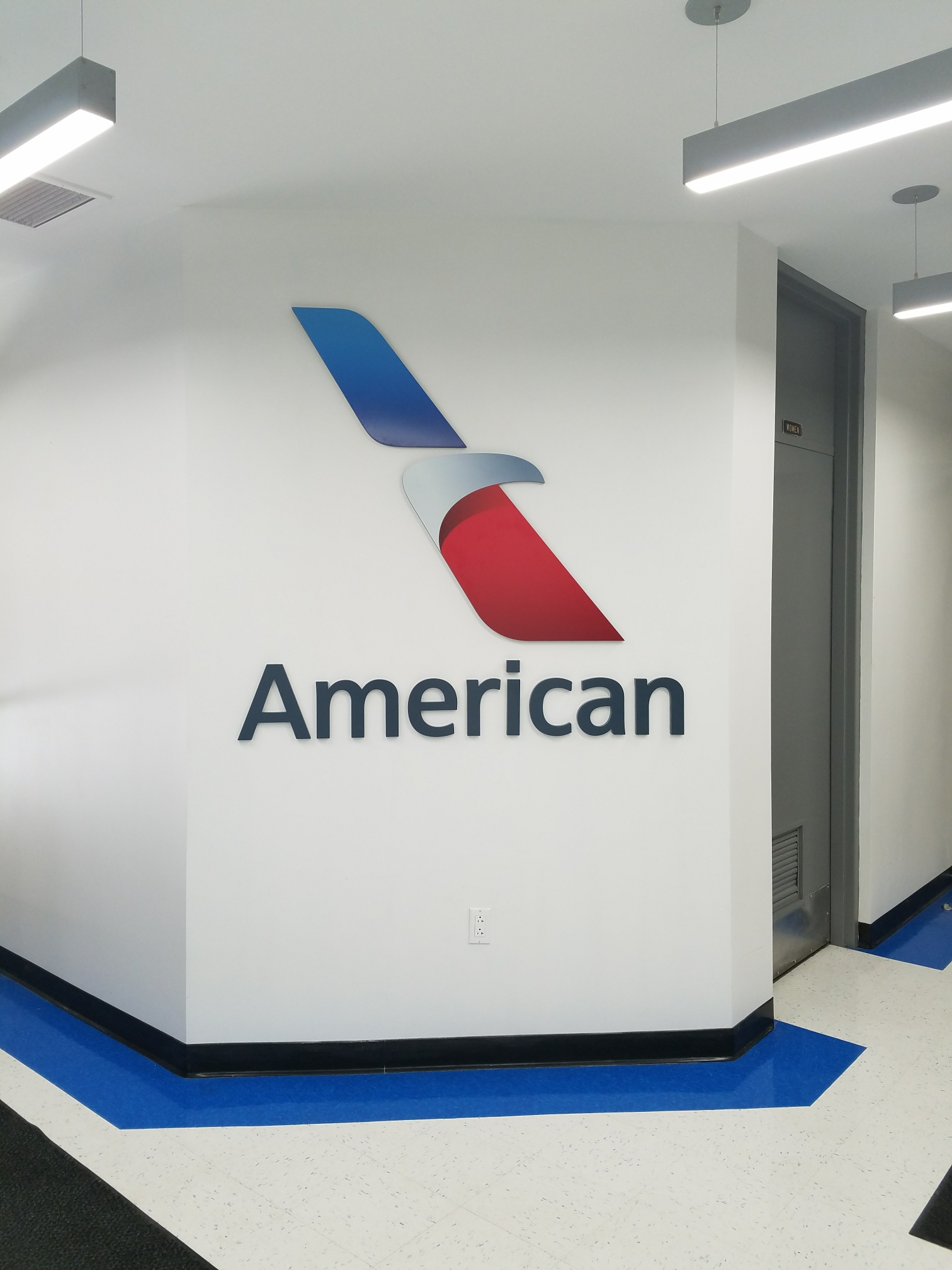 American Airlines wall lettering and logo