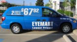 Eyemart promotional van wrap advertising glasses deals and one-hour service.