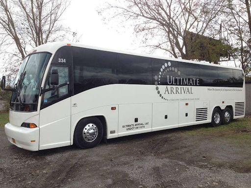 Vinyl car wrap on charter bus with company logo