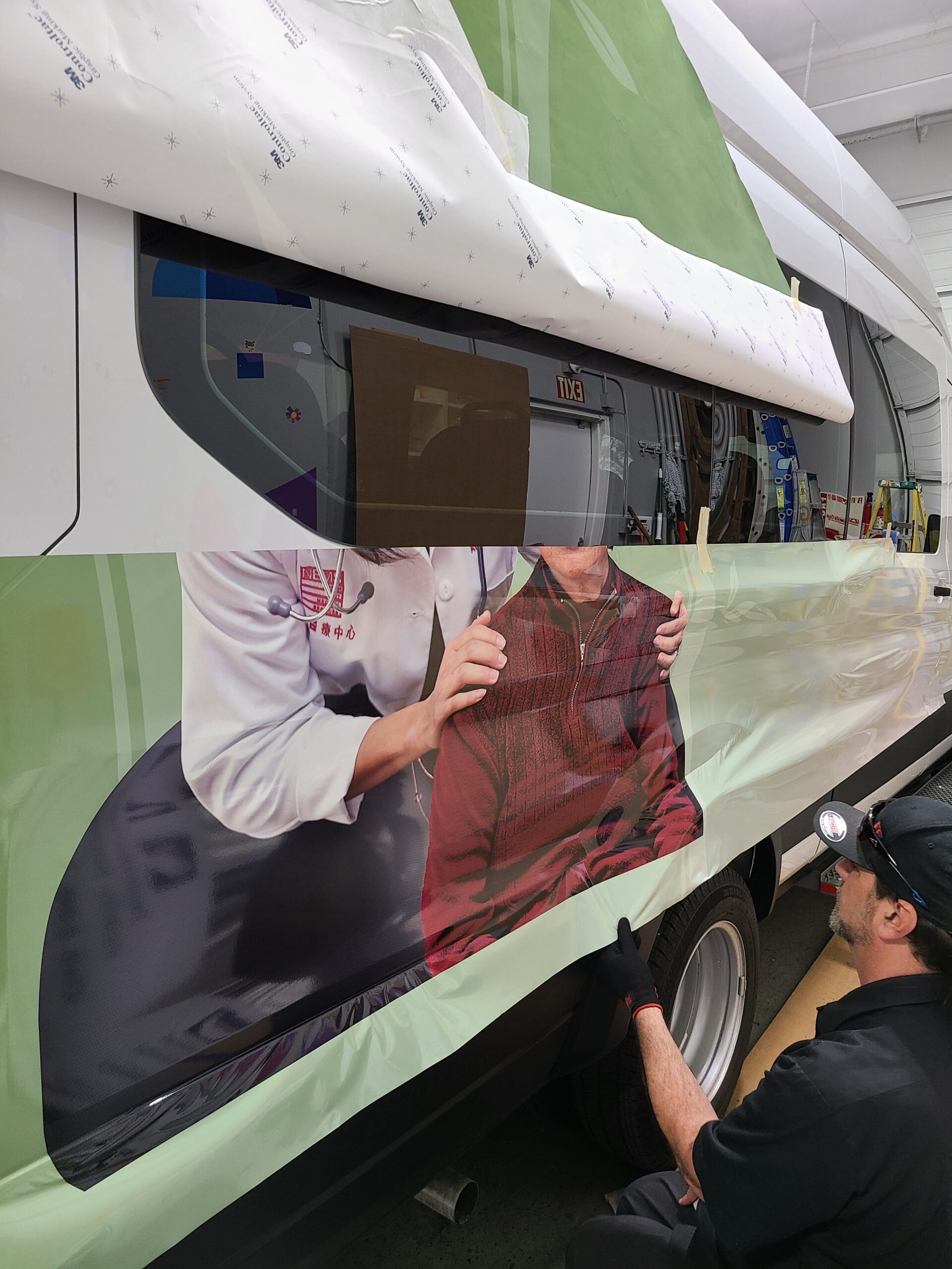 Vinyl car wrap installation on van