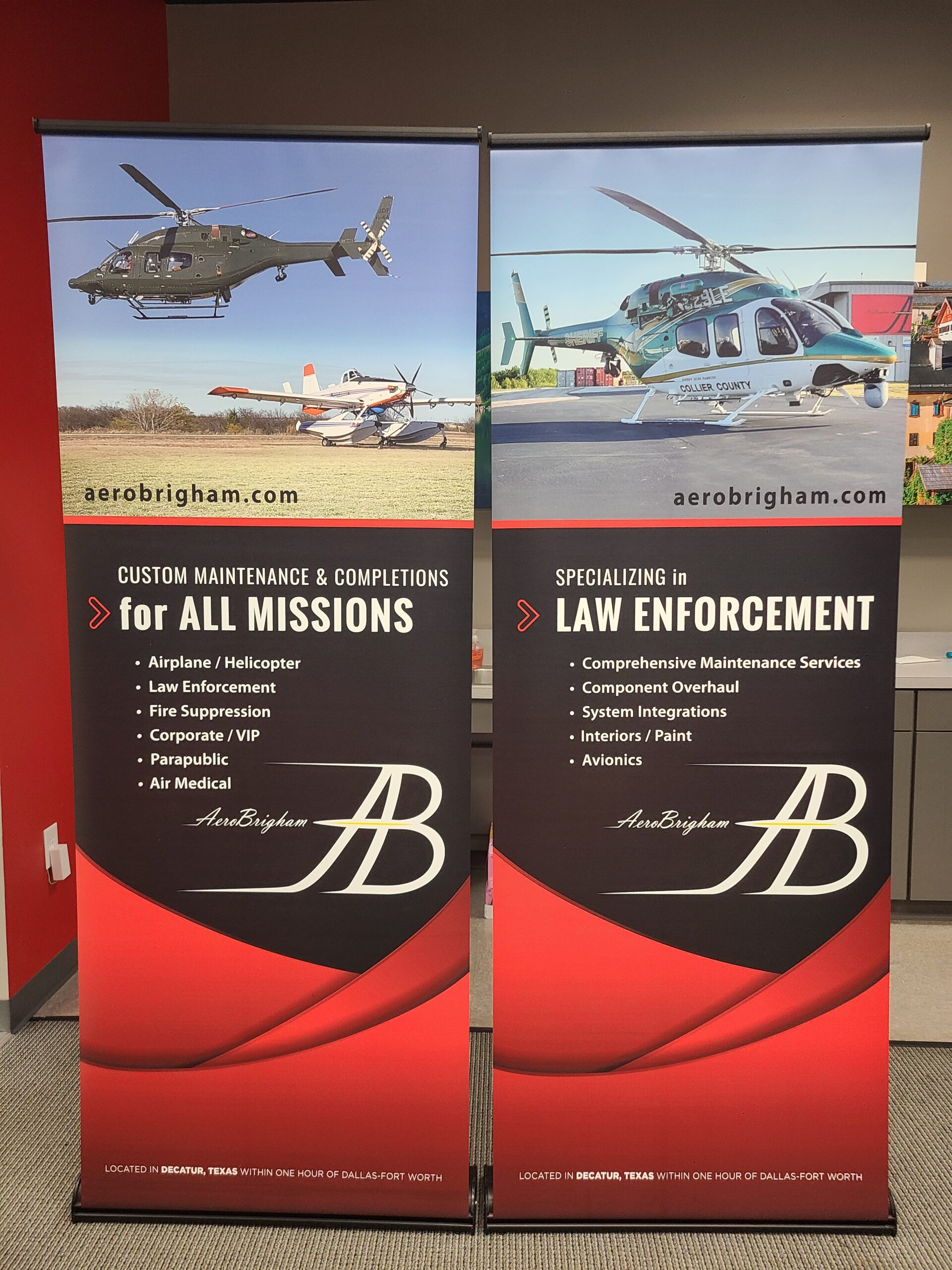 Two retractable custom banners with promotional graphics