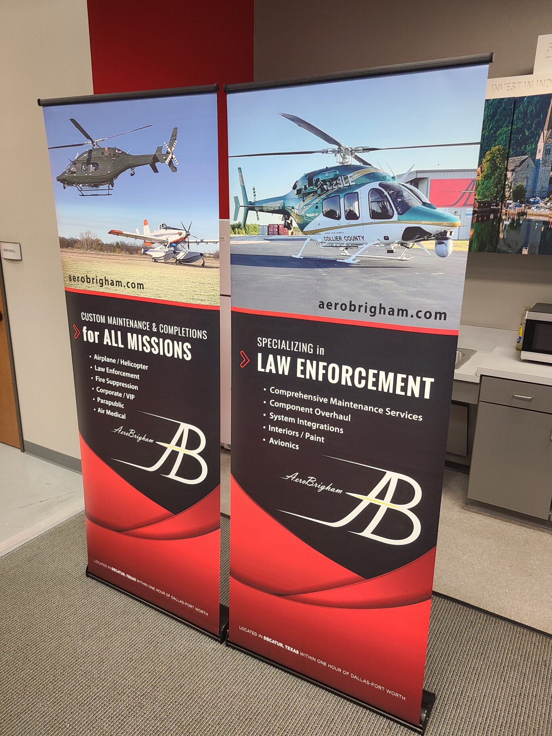Two retractable custom banners with promotional graphics