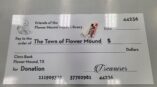 Large dry erase paper check, ideal for donation presentations.