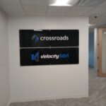 Stand off acrylic signage of crossroads and VelocitySBA logo