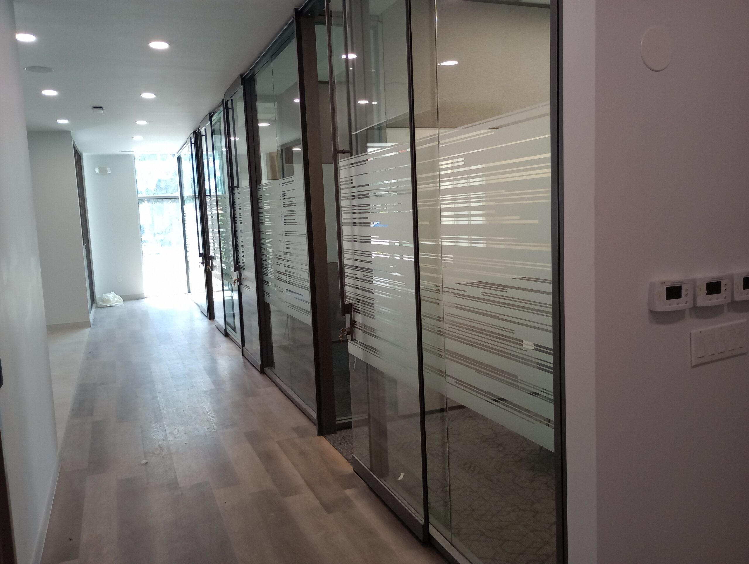 Sleek frosted glass pattern on window panels and doors