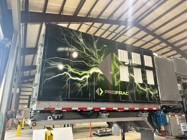 Side of a data trailer with a panel car wrap with green lightning and company logo