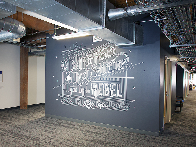 Creative writing decor on a wall with artistic flair