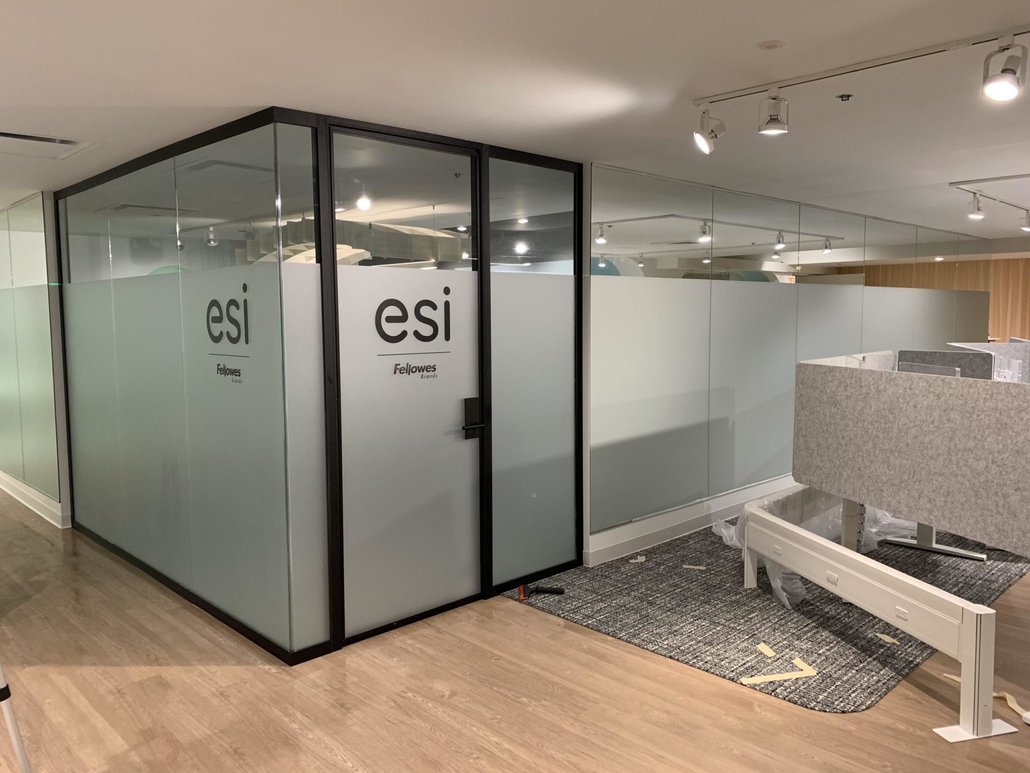 Interior design with glass cubicle and desk on modern flooring