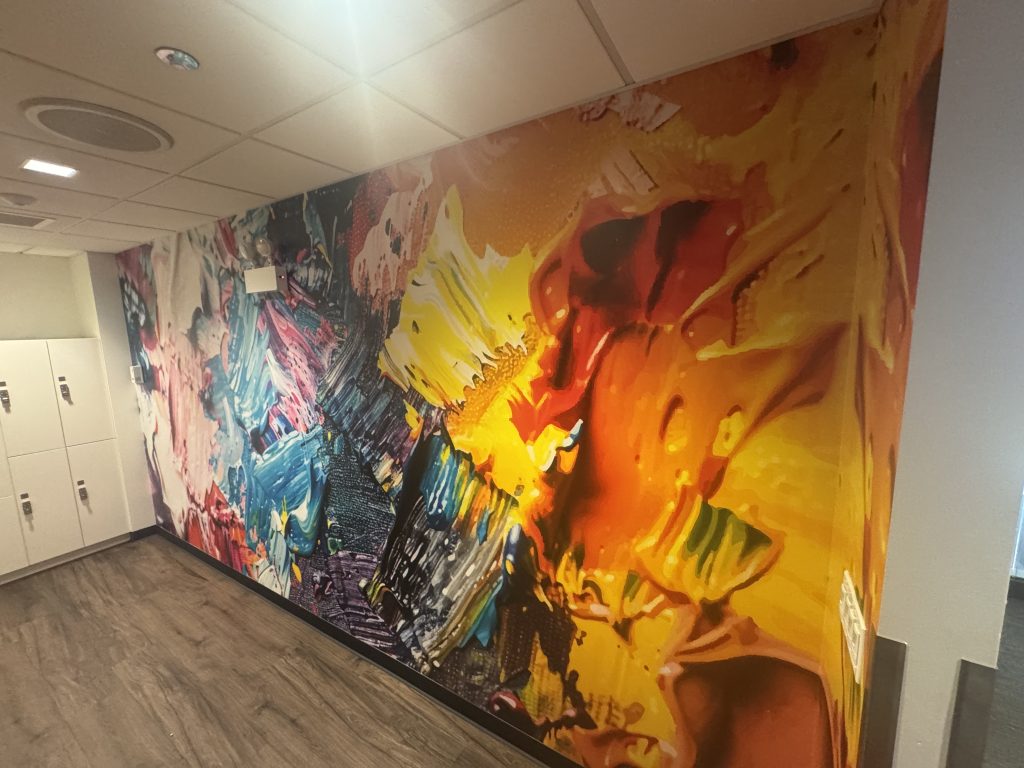 Large colorful printed wall mural with abstract paint design in Chicago, IL.