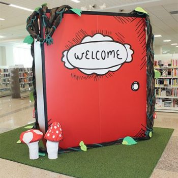 Large fabric cube sign with printed graphics and 3D mushroom props in Chicago, IL.