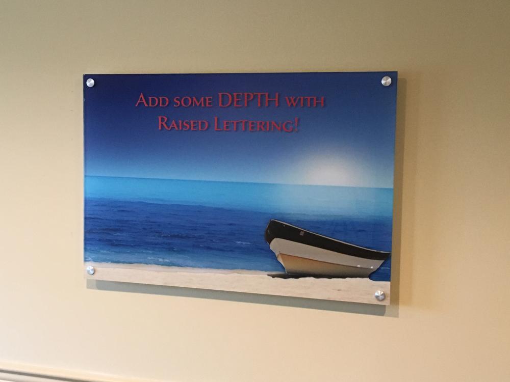 Raised lettering sign