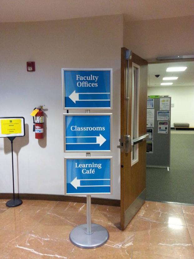 custom directional signs in office. 