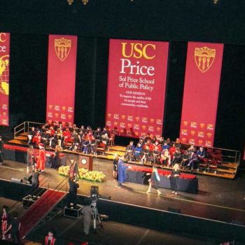 USC graduation banners on stage