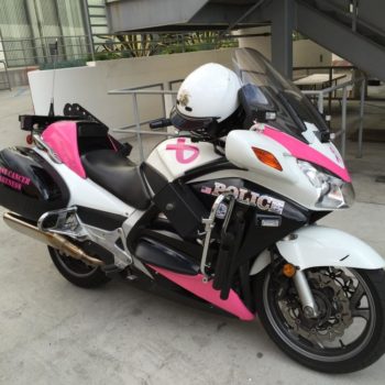 Breast cancer awareness vehicle wrap on police motorcycle