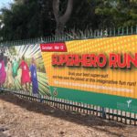 Portfolio banner advertising a superhero run
