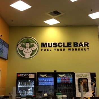 Indoor sign for Muscle Bar